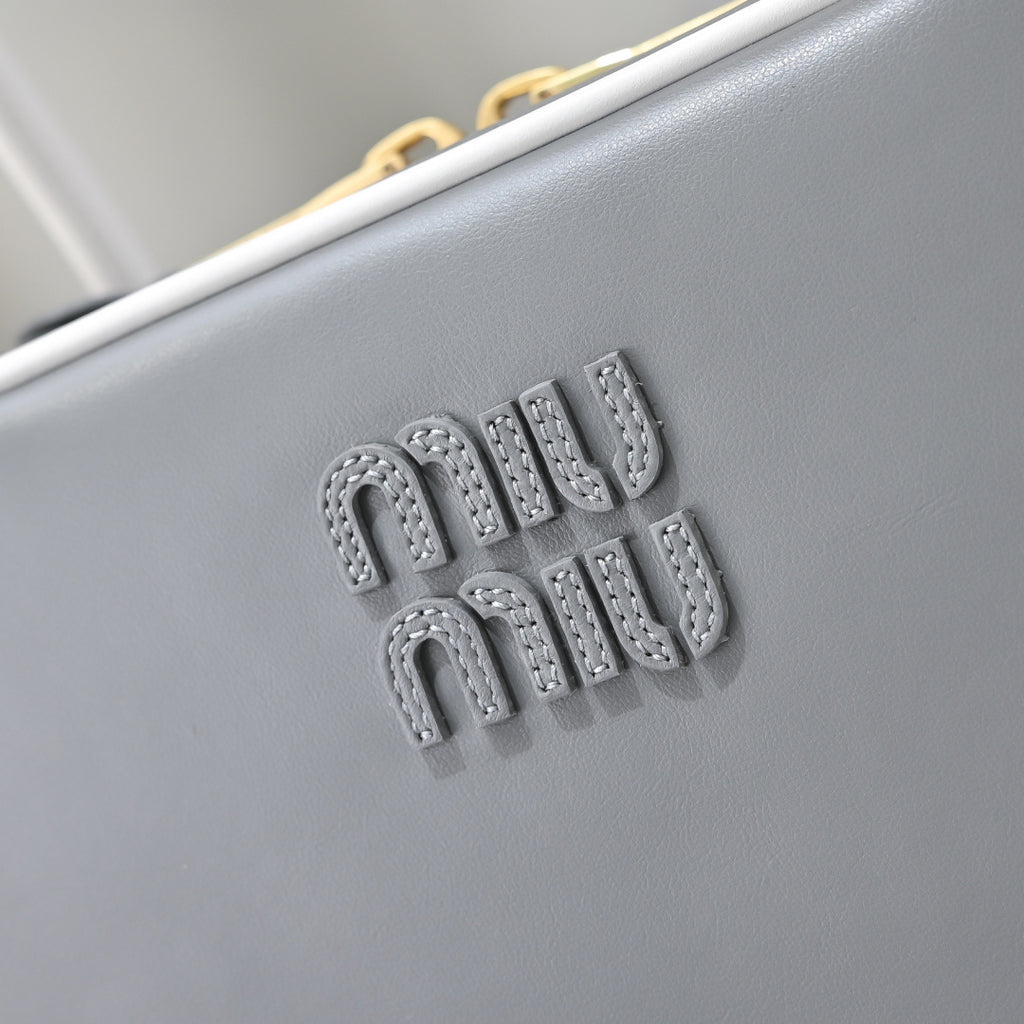 Grey Rectangular Bag with White Handles and Trim