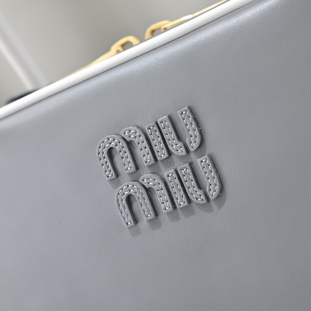 Grey Rectangular Bag with White Handles and Trim
