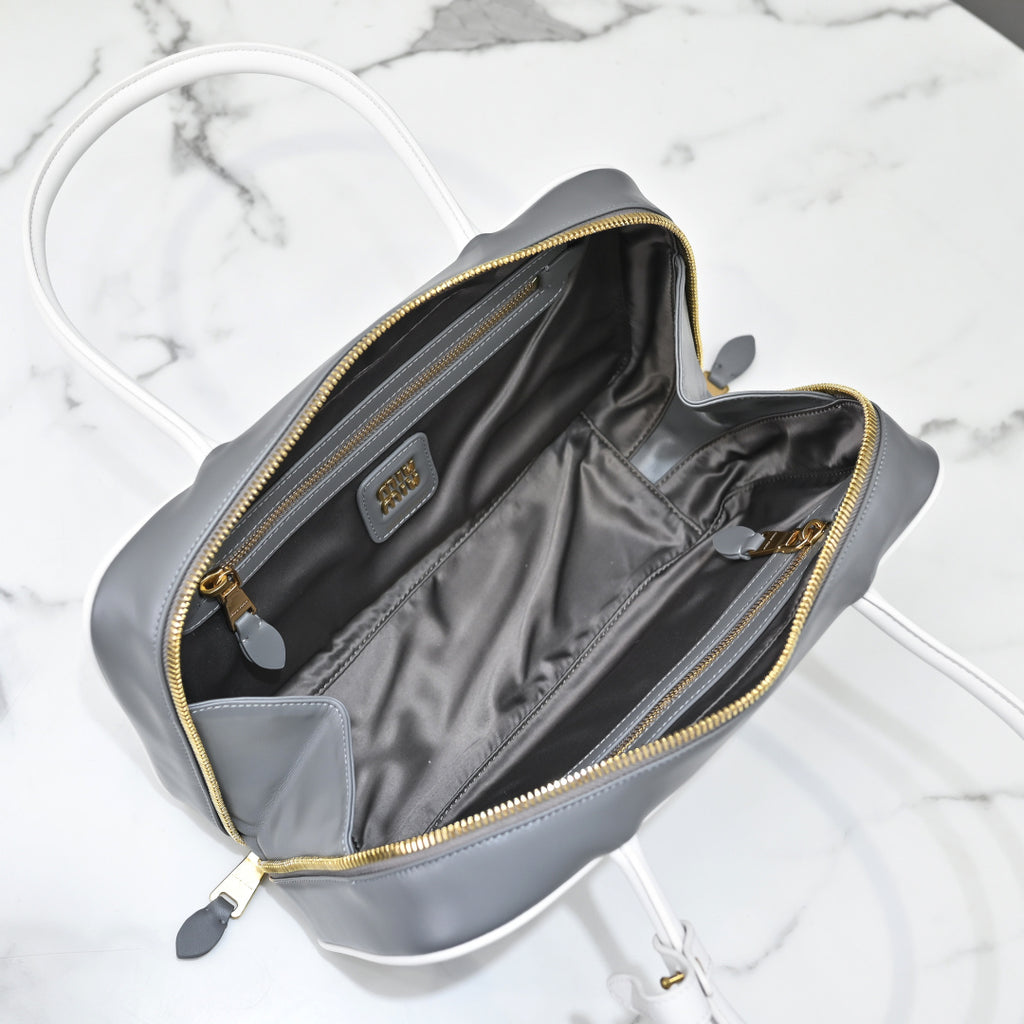 Grey Rectangular Bag with White Handles and Trim