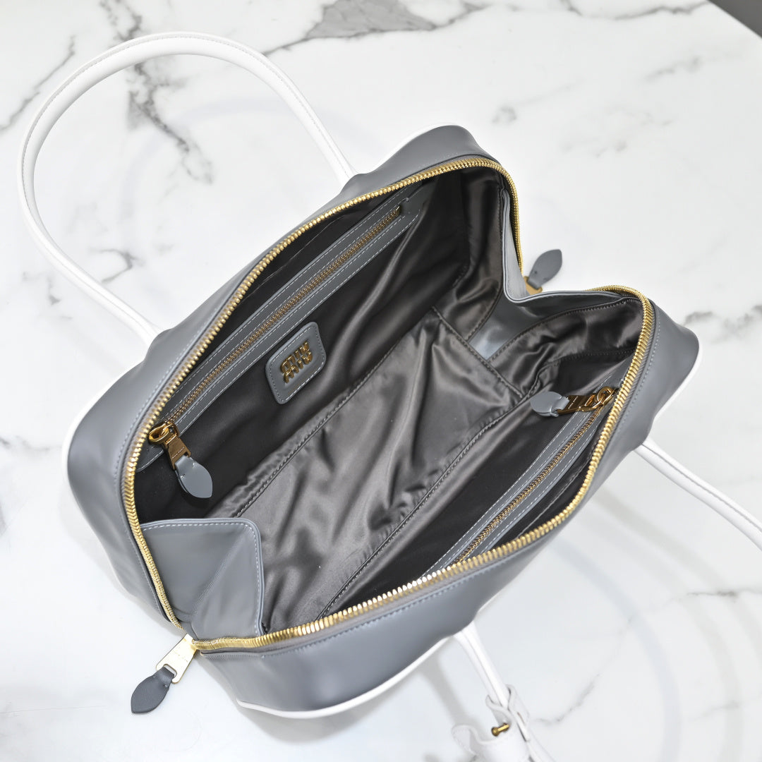 Grey Rectangular Bag with White Handles and Trim