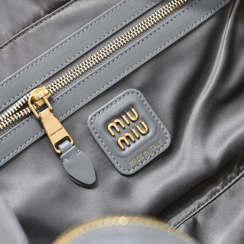 Grey Rectangular Bag with White Handles and Trim